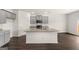 Stylish kitchen with granite countertops, sleek appliances, and a spacious island, perfect for entertaining at 572 Whitman Ln # 19, Stockbridge, GA 30281