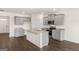 Well-equipped kitchen with stainless steel appliances, granite counters and a large island for food preparation at 572 Whitman Ln # 19, Stockbridge, GA 30281