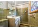 Bathroom features original tiling, glass shower, and stained glass window at 725 & 761 School Road, Hampton, GA 30228