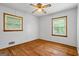 Bedroom featuring hardwood floors, natural light, and neutral walls at 725 & 761 School Road, Hampton, GA 30228