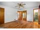 Spacious bedroom featuring hardwood floors, ceiling fan, and multiple closets at 725 & 761 School Road, Hampton, GA 30228