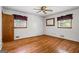 Bedroom featuring hardwood floors, natural light, and a ceiling fan at 725 & 761 School Road, Hampton, GA 30228