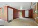 Spacious attached carport with brick accent wall at 725 & 761 School Road, Hampton, GA 30228