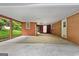 Spacious attached carport with brick accent wall at 725 & 761 School Road, Hampton, GA 30228