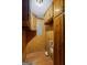 Wood paneled laundry room with wood floors, hookups, and overhead cabinets at 725 & 761 School Road, Hampton, GA 30228