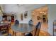 Open dining room has views to a sitting room, kitchen, and another living space at 1349 Springwood Nw Dr, Conyers, GA 30012