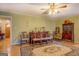 Classic living room with hardwood floors, vintage furnishings, and a decorative rug at 1349 Springwood Nw Dr, Conyers, GA 30012