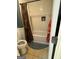 Bathroom featuring a toilet, shower with a decorative curtain, and white tile at 374 Persimmon Dr, Sharpsburg, GA 30277