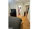 Comfortable bedroom with closet, TV and wooden floors at 374 Persimmon Dr, Sharpsburg, GA 30277