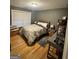 Spacious bedroom with natural light, a bed and desk at 374 Persimmon Dr, Sharpsburg, GA 30277