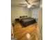 Cozy bedroom with a ceiling fan, window, and natural light at 374 Persimmon Dr, Sharpsburg, GA 30277