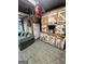 Garage with custom-built storage cabinets and a relaxing sofa area at 374 Persimmon Dr, Sharpsburg, GA 30277