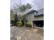 Exterior view of the garage connected to the house with ample parking space at 374 Persimmon Dr, Sharpsburg, GA 30277