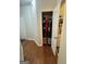 Hallway includes coat closet and a laundry room with modern appliances, offering storage and convenience at 374 Persimmon Dr, Sharpsburg, GA 30277