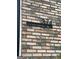 Close-up of house number on a brick wall at 374 Persimmon Dr, Sharpsburg, GA 30277