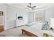 Bedroom featuring a queen bed with a window view, carpet and white dresser at 108 Turnberry Trce, Sharpsburg, GA 30277
