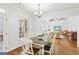 Cozy breakfast nook offers views to the back porch and living room at 108 Turnberry Trce, Sharpsburg, GA 30277