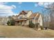 Beautiful two-story home showcasing its architectural details, manicured landscaping, and desirable curb appeal at 108 Turnberry Trce, Sharpsburg, GA 30277