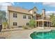 Spacious two-story home with a large backyard pool, screened-in porch, and upper decks for outdoor entertaining at 108 Turnberry Trce, Sharpsburg, GA 30277