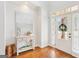 Welcoming foyer features a table with decor and an open front door at 108 Turnberry Trce, Sharpsburg, GA 30277