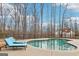 Enjoy this in-ground pool surrounded by lush greenery and a private fence at 108 Turnberry Trce, Sharpsburg, GA 30277