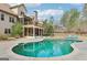 Inviting backyard with a sparkling pool, deck, and outdoor entertaining space at 108 Turnberry Trce, Sharpsburg, GA 30277