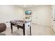 Recreation room with a foosball table, a TV, and a comfortable beanbag chair for relaxation and entertainment at 108 Turnberry Trce, Sharpsburg, GA 30277