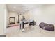 Recreation room featuring fitness equipment and a foosball table, offering ample space for leisure activities at 108 Turnberry Trce, Sharpsburg, GA 30277