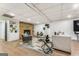 Basement sitting area featuring fireplace, luxury vinyl floors, comfortable furniture and contemporary decor at 2019 Emerald Dr, Jonesboro, GA 30236