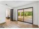 Bedroom featuring luxury vinyl floors, a sliding glass door to the outside and a connecting sitting area at 2019 Emerald Dr, Jonesboro, GA 30236