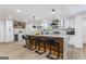 Stylish kitchen featuring an island with seating, pendant lighting, and stainless steel appliances at 2019 Emerald Dr, Jonesboro, GA 30236
