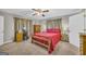 Bright bedroom with large windows and hardwood floors at 7616 Nicholson Rd, Cumming, GA 30028
