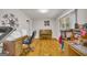 Functional office space featuring a piano and hardwood floors at 7616 Nicholson Rd, Cumming, GA 30028