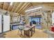 Functional workshop space featuring shelving, work area, and natural light at 7616 Nicholson Rd, Cumming, GA 30028