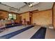 Spacious garage featuring painted floors, paneled walls, and ample storage area at 171 Wynn Dr, Hampton, GA 30228