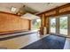 A view of the garage featuring painted floors, paneled walls, and an automatic door at 171 Wynn Dr, Hampton, GA 30228