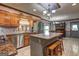 Bright kitchen featuring a central island, custom cabinetry, and modern stainless appliances at 171 Wynn Dr, Hampton, GA 30228