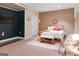 Cozy bedroom with a decorative brick wall, comfortable bed, and stylish furnishings at 139 Crown Forest Dr, Mcdonough, GA 30252