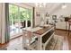 Open-concept dining area with views of the deck at 139 Crown Forest Dr, Mcdonough, GA 30252