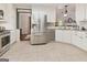 Beautiful kitchen with stainless steel appliances and white cabinetry at 139 Crown Forest Dr, Mcdonough, GA 30252