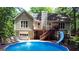 This home's above-ground pool with slide is perfect for hot summer days at 139 Crown Forest Dr, Mcdonough, GA 30252