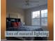 Bright bedroom with natural lighting and a ceiling fan at 30 Cynthia Ct, Fayetteville, GA 30215
