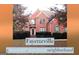 Charming two-story brick home with lush landscaping and classic design elements in Fayetteville neighborhood at 30 Cynthia Ct, Fayetteville, GA 30215
