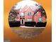 Traditional two-story brick home with a manicured lawn and mature landscaping at 30 Cynthia Ct, Fayetteville, GA 30215