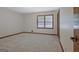 Bedroom featuring carpeted floor and large window at 110 Silver Leaf Dr, Fayetteville, GA 30214