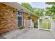 Attached home's deck with a sliding glass door, white railing, and steps to the backyard at 110 Silver Leaf Dr, Fayetteville, GA 30214