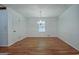 Bright dining room with wainscoting, hardwood floors, and chandelier lighting at 110 Silver Leaf Dr, Fayetteville, GA 30214