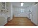 Well-lit kitchen featuring white appliances, ample counter space, and storage cabinets at 110 Silver Leaf Dr, Fayetteville, GA 30214