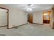 Spacious main bedroom with ceiling fan, walk-in closet, and en-suite bathroom access at 110 Silver Leaf Dr, Fayetteville, GA 30214