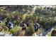 An aerial shot captures homes surrounded by trees, showcasing the neighborhood's serene setting at 8040 Classic Dr, Jonesboro, GA 30236